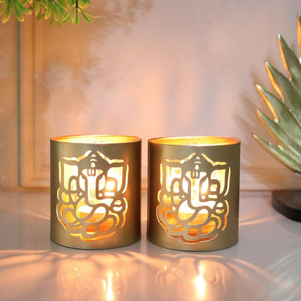 Buy Ganesha Chaitanya Tealight Candle Holder (Gold) - Set Of Two Candle Holders from Vaaree