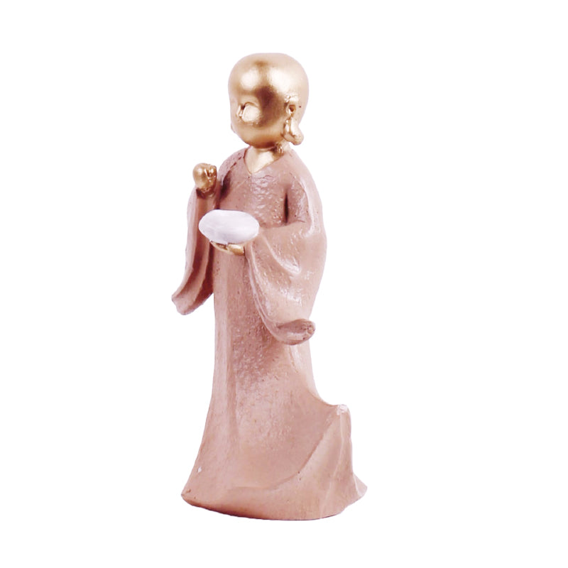 Buy Ethereal Little Monk Showpiece - Gold & Pink Showpieces from Vaaree