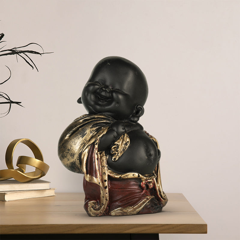 Buy Baby Monk Laugh Showpiece Showpiece from Vaaree