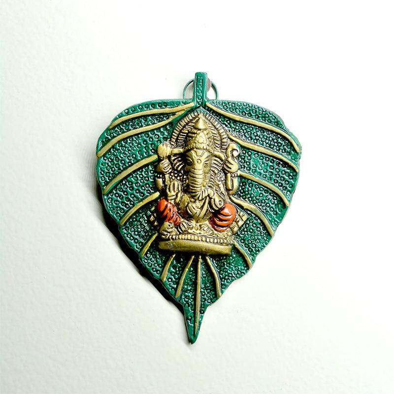 Buy Lord Ganesha On Peepal Leaf Idol Showpiece from Vaaree