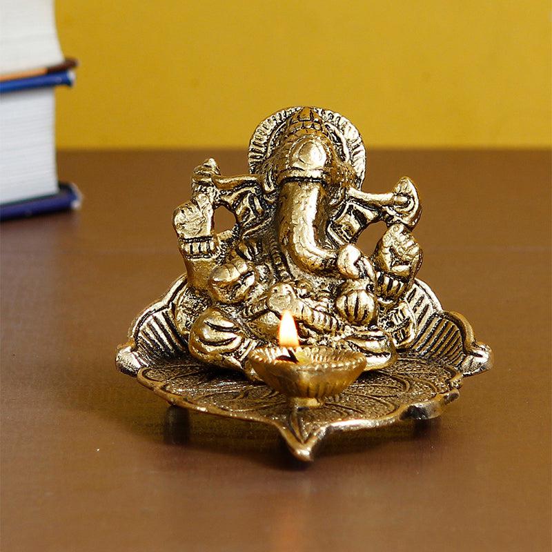 Buy Vinayaka Leaf Diya - Gold Idols & Sets from Vaaree