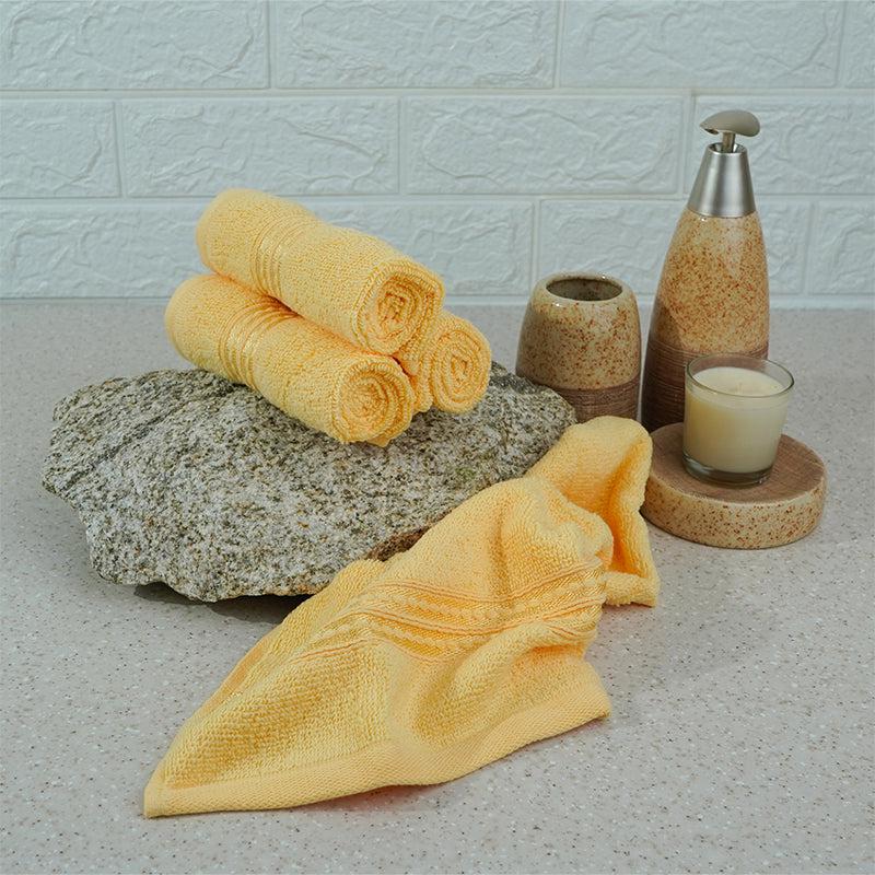 Buy Micro Cotton LuxeDry Solid Face Towel (Yellow) - Set Of Four Hand & Face Towels from Vaaree