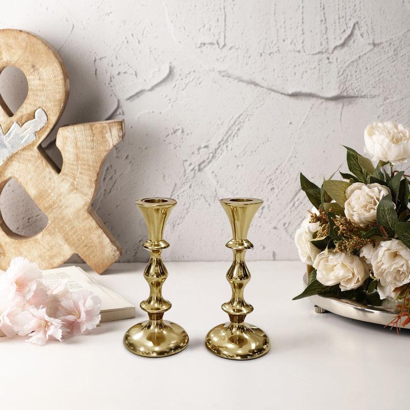 Buy Ottista Taper Candle Holder (Gold) - Set Of Two Candle Holders from Vaaree