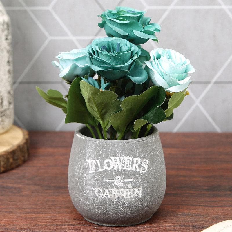 Buy Faux Teal Rose With Pot Artificial Flowers from Vaaree