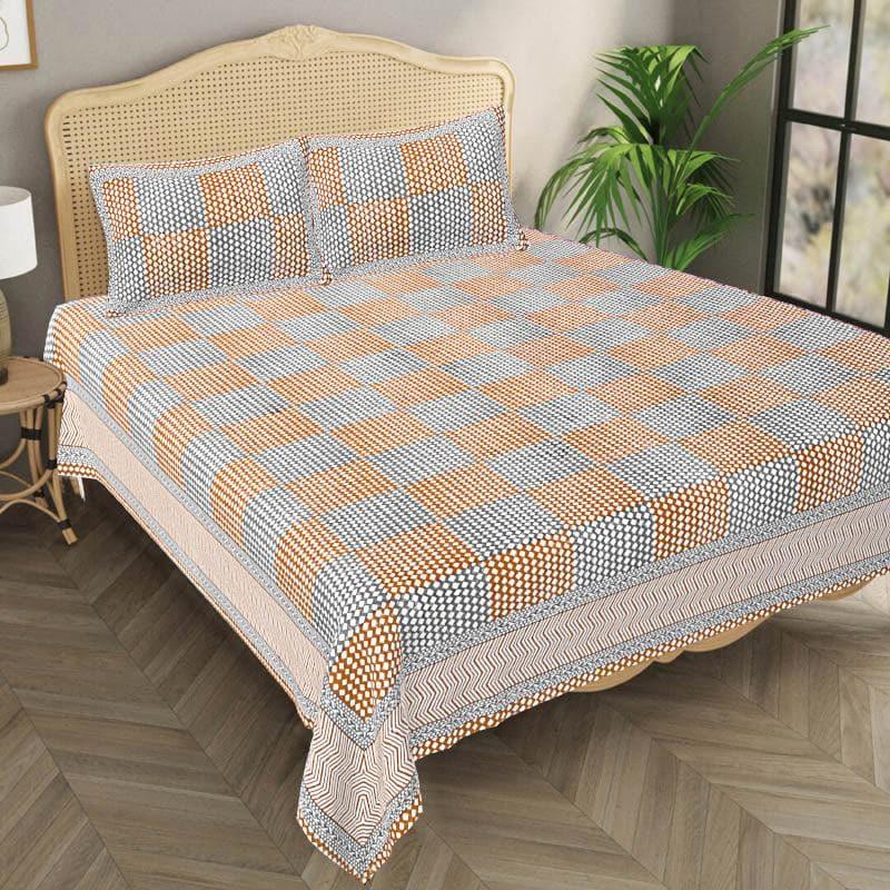 Buy Abira Checkered Bedsheet - Orange Bedsheets from Vaaree