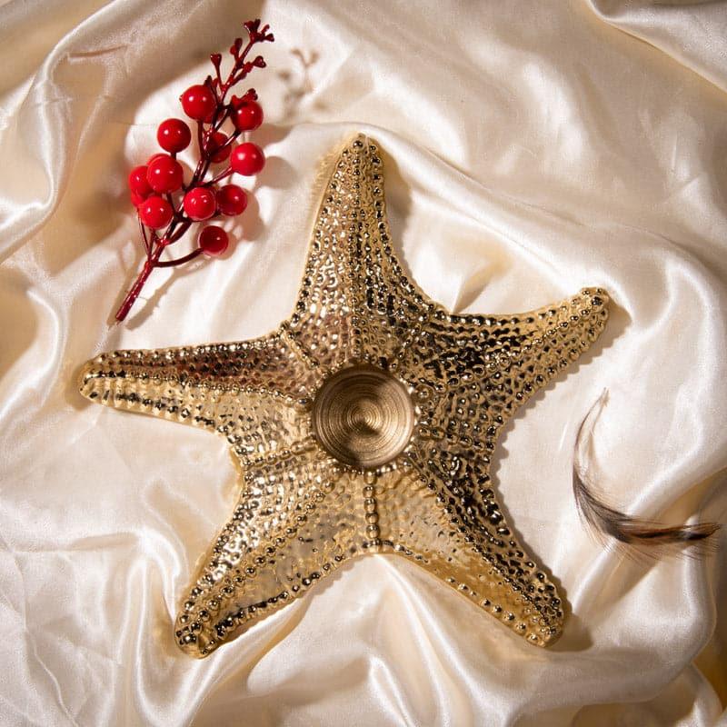 Buy Starfish Shin Candle Holder Candle Holders from Vaaree