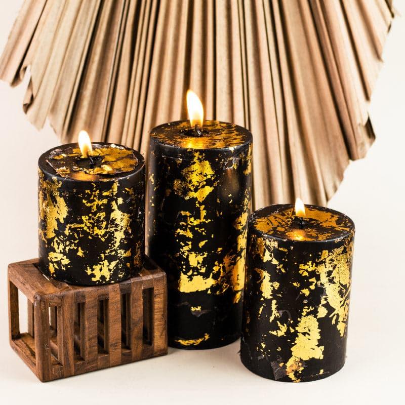 Buy Dorado Unscented Pillar Candle - Black Gold Candles from Vaaree