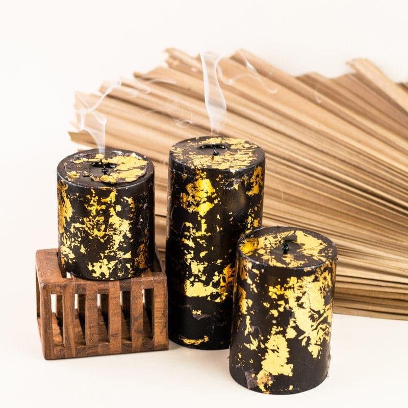 Buy Dorado Unscented Pillar Candle - Black Gold Candles from Vaaree