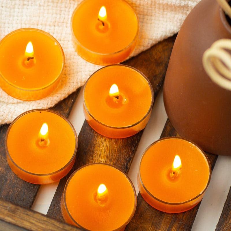 Buy Milo Amber Quartz & Oudh Scented Tealight Candle - Set Of Twelve Candles from Vaaree