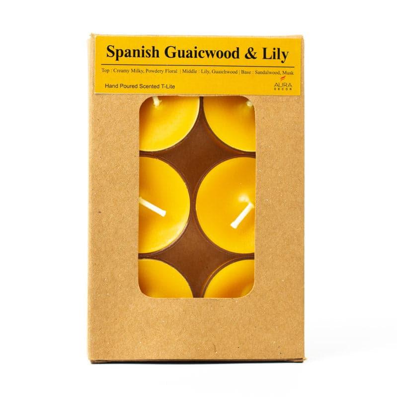 Buy Milo Spanish Guwaicwood & Lily Scented Tealight Candle - Set Of Twelve Candles from Vaaree