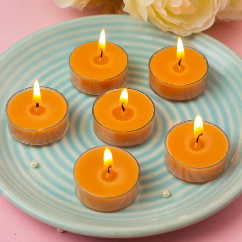 Buy Milo Sparkling Peony Scented Tealight Candle - Set Of Twelve Candles from Vaaree