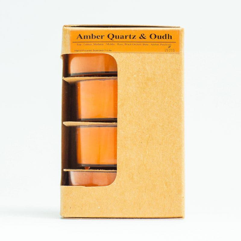 Buy Sidra Amber Quartz & Oudh Scented Candle - Set Of Four Candles from Vaaree