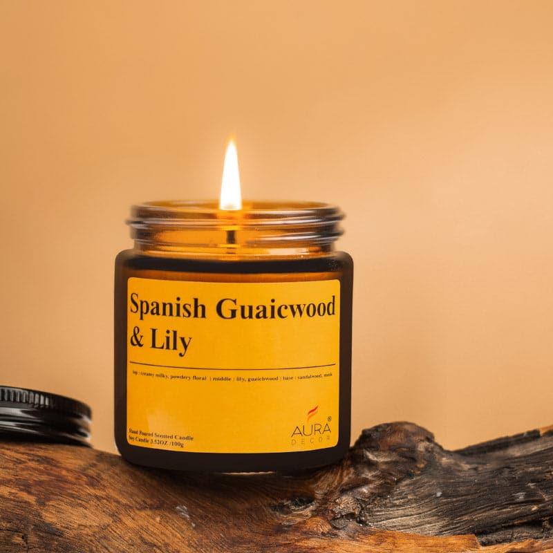 Buy Spanish Guwaicwood & Lily Scented Jar Candle - 100 GM Candles from Vaaree