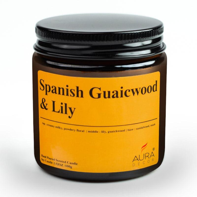 Buy Spanish Guwaicwood & Lily Scented Jar Candle - 100 GM Candles from Vaaree