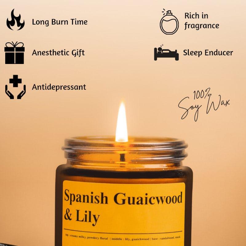 Buy Spanish Guwaicwood & Lily Scented Jar Candle - 100 GM Candles from Vaaree