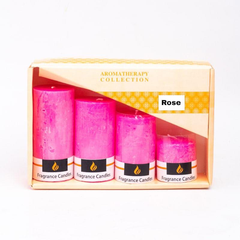 Buy Zora Rose Scented Pillar Candle - Set Of Four Candles from Vaaree