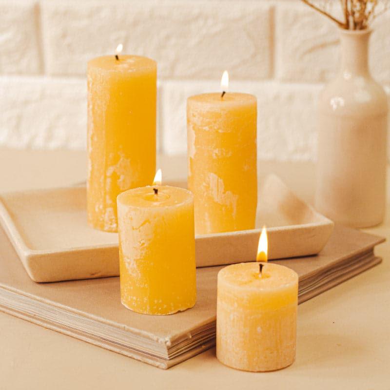 Buy Zora Vanilla Scented Pillar Candle - Set Of Four Candles from Vaaree