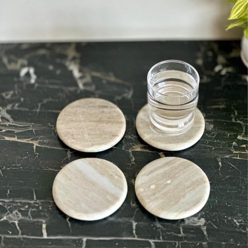 Buy Aura Marble Coaster (Beige) - Set Of Four Coasters from Vaaree