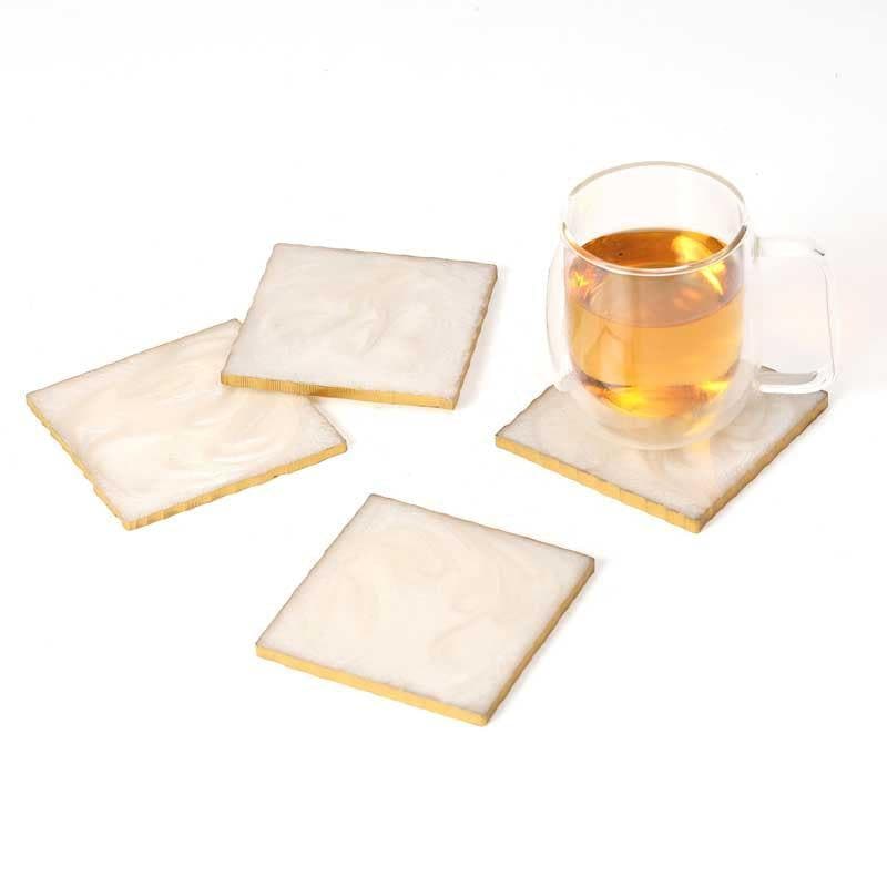 Buy Marble Swirl Coaster (Cream) - Set Of Six Coasters from Vaaree