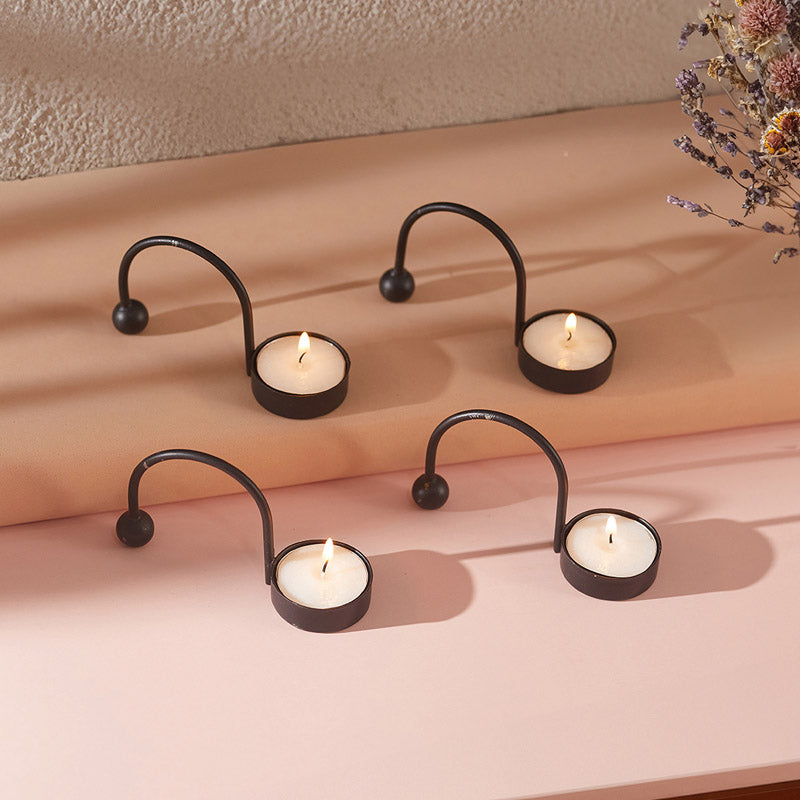 Buy Zuria Tealight Candle Holder (Black) - Set of Four Tea Light Candle Holders from Vaaree