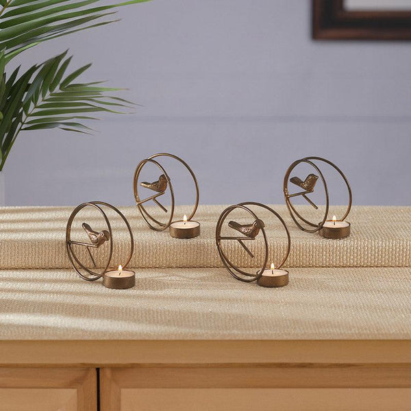 Buy Alaiza Chirp Tealight Candle Holder (Copper) - Set Of Four Tea Light Candle Holders from Vaaree