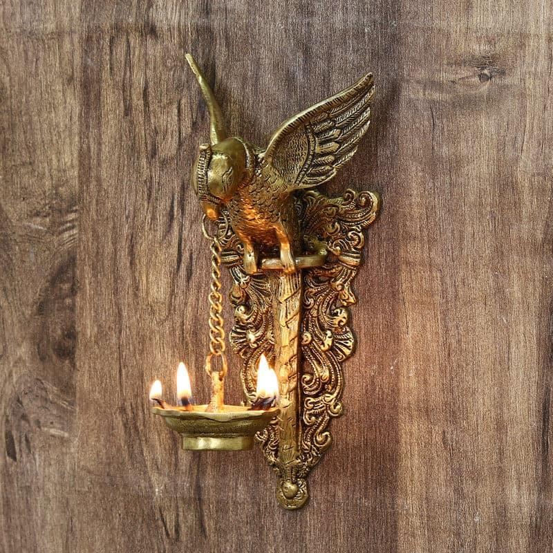 Buy Brass Bird Wall Hanging Diya Diyas from Vaaree