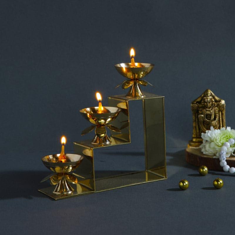 Buy Brass Kamal Step Diya Diyas from Vaaree