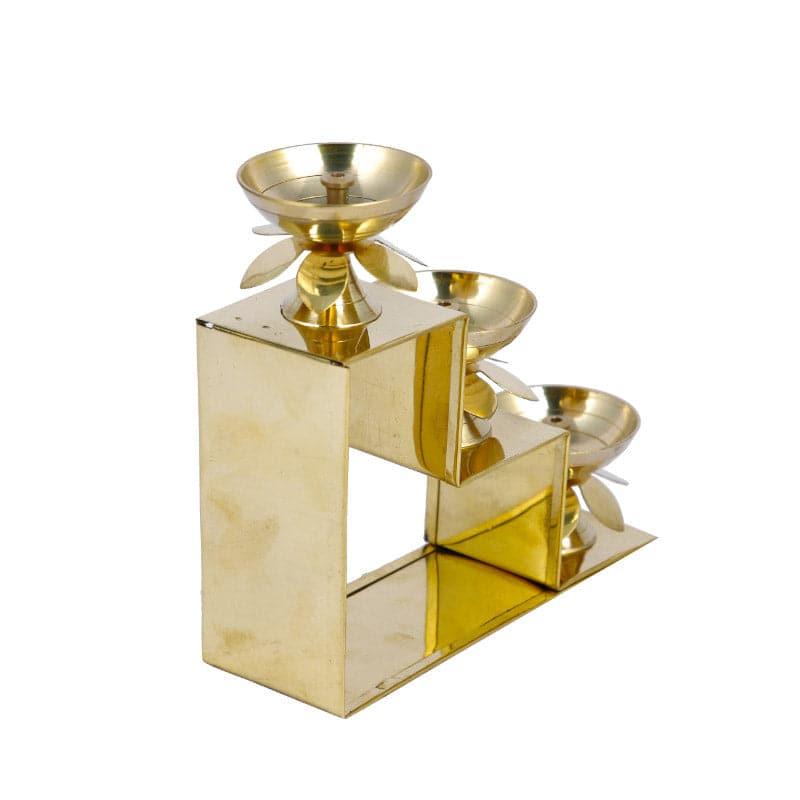 Buy Brass Kamal Step Diya Diyas from Vaaree