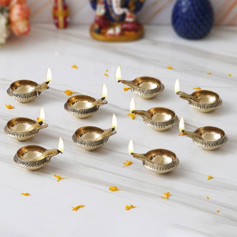 Buy Dritha Brass Diya - Set Of Ten Diyas from Vaaree