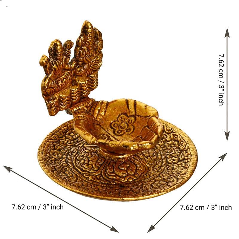 Buy Ganesha & Lakshmi Metal Diya Diyas from Vaaree