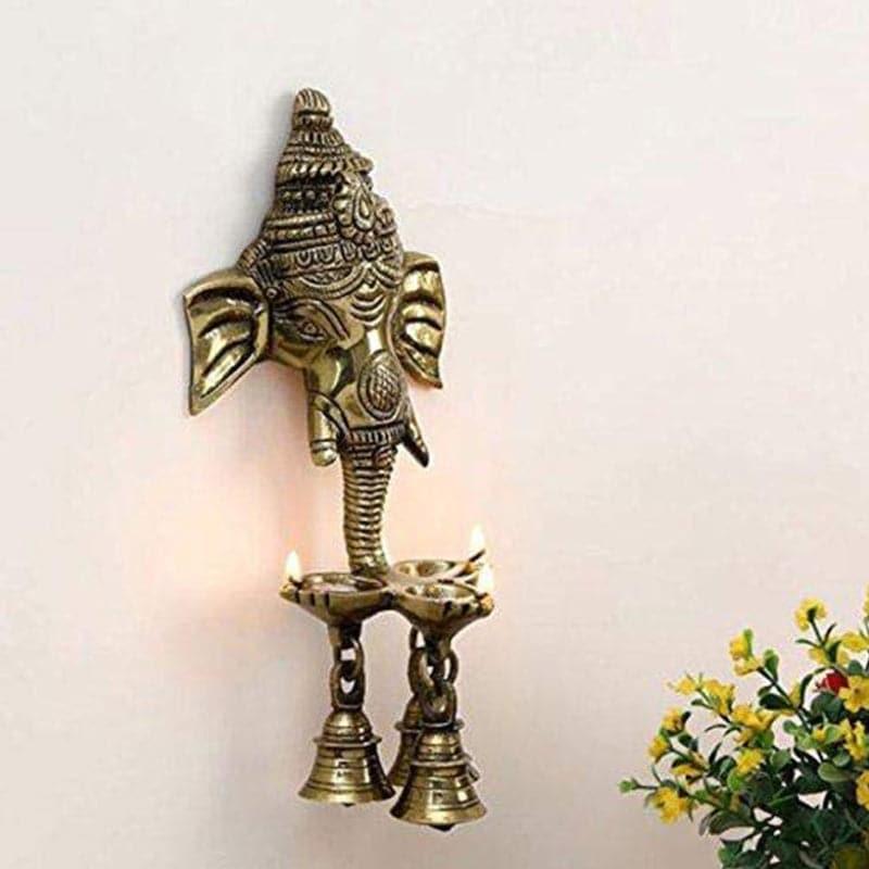 Buy Ganesha Deepak Diya With Bell Wall Hanging Diyas from Vaaree