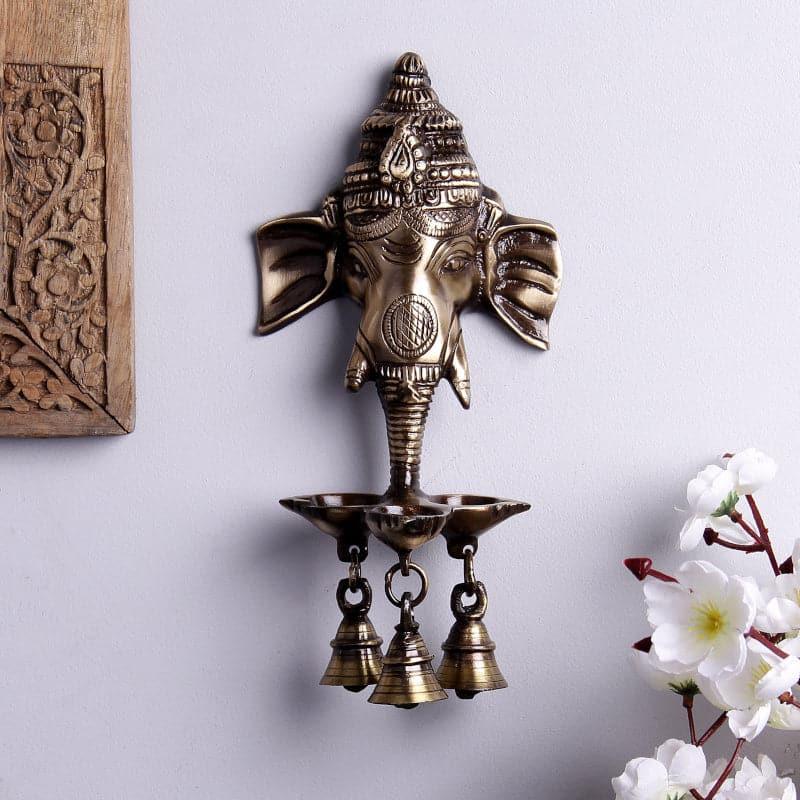 Buy Ganesha Deepak Diya With Bell Wall Hanging Diyas from Vaaree