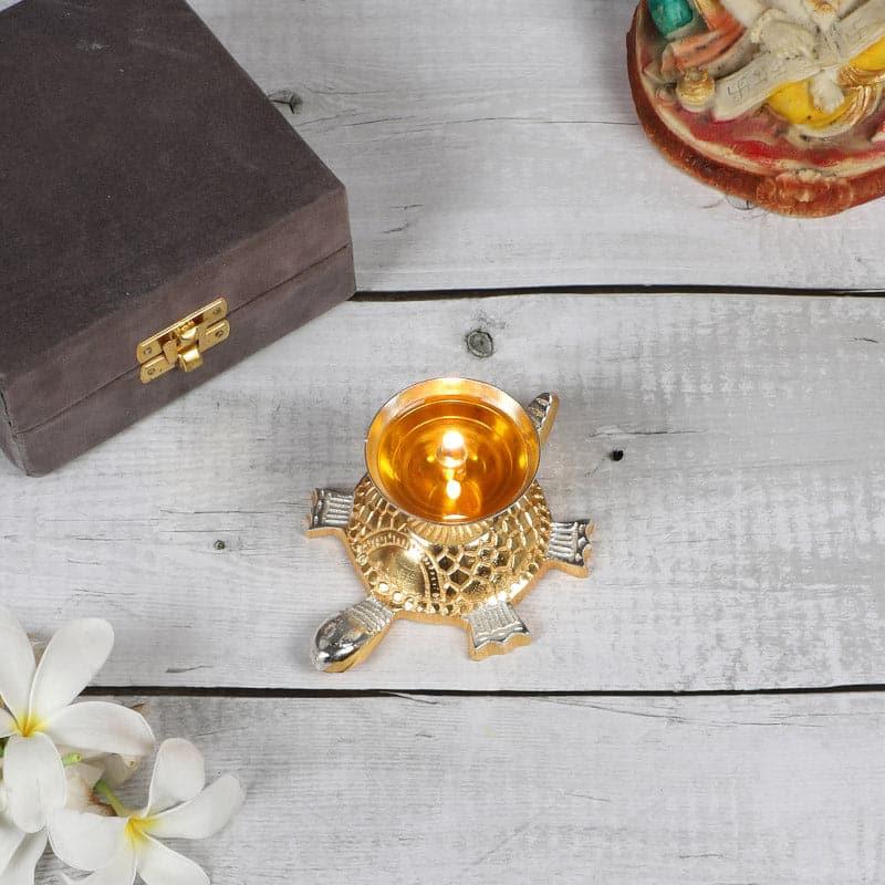 Buy Golden Tortoise Akhand Diya Diyas from Vaaree