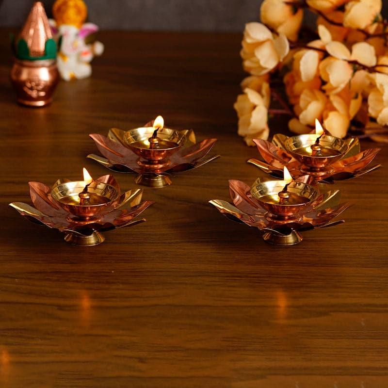 Buy Lotus Bloom Brass Diya - Set Of Four Diyas from Vaaree