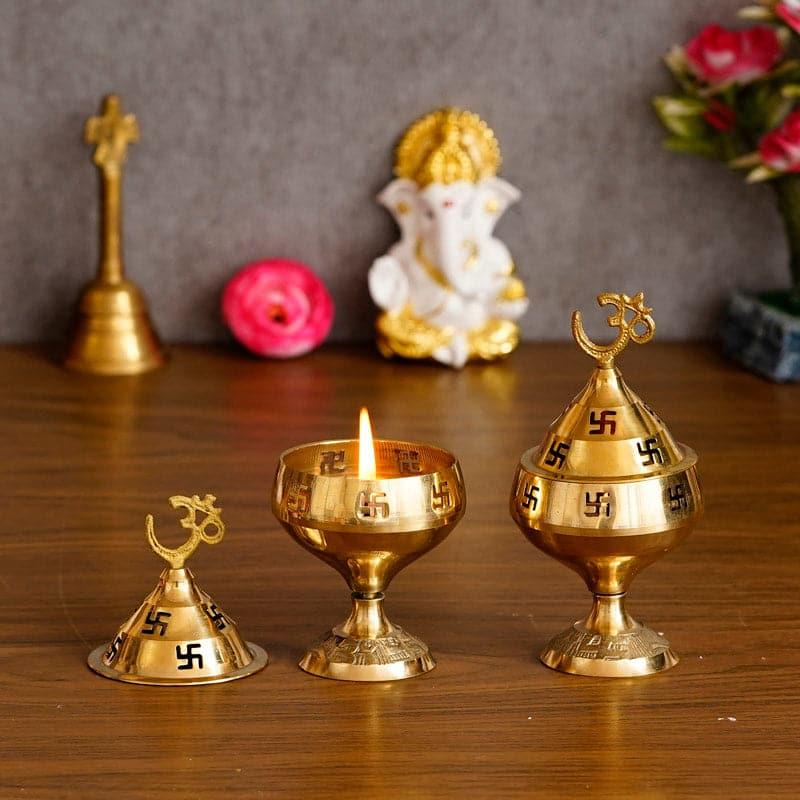 Buy Om Swastik Brass Diya - Set Of Two Diyas from Vaaree