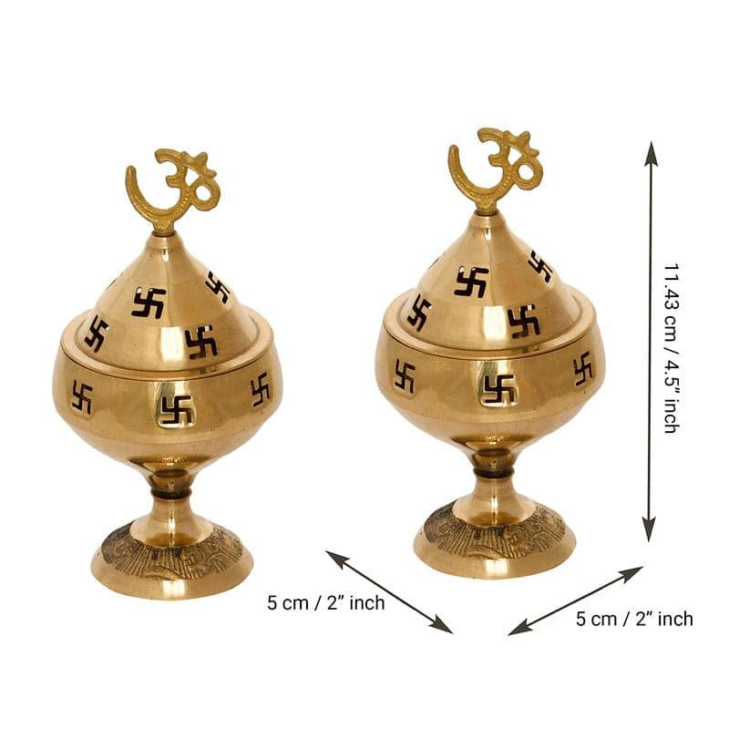 Buy Om Swastik Brass Diya - Set Of Two Diyas from Vaaree