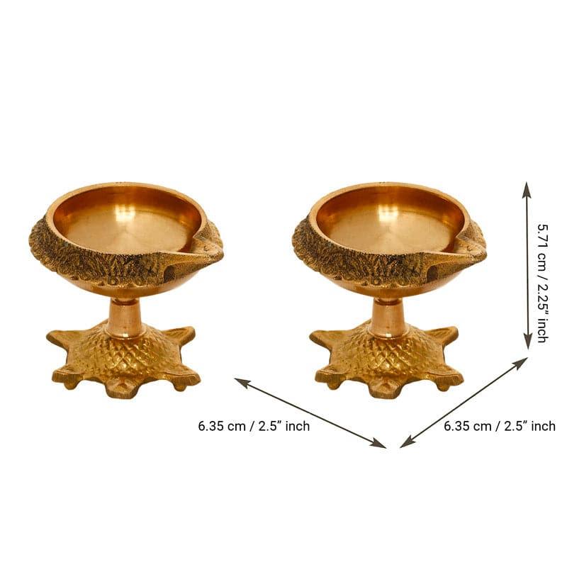 Buy Tortoise Brass Diya - Set Of Two Diyas from Vaaree