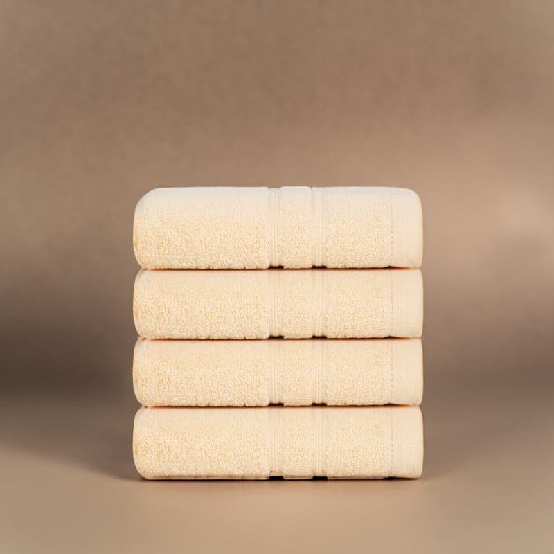 Buy Hand & Face Towels - Micro Cotton LuxeDry Soothe Face Towel (Beige) - Set Of Four at Vaaree online