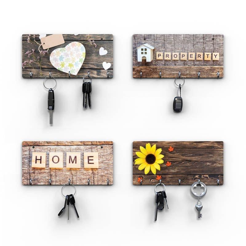 Buy Sweet Home Key Holder - Set Of Four Hooks & Key Holders from Vaaree