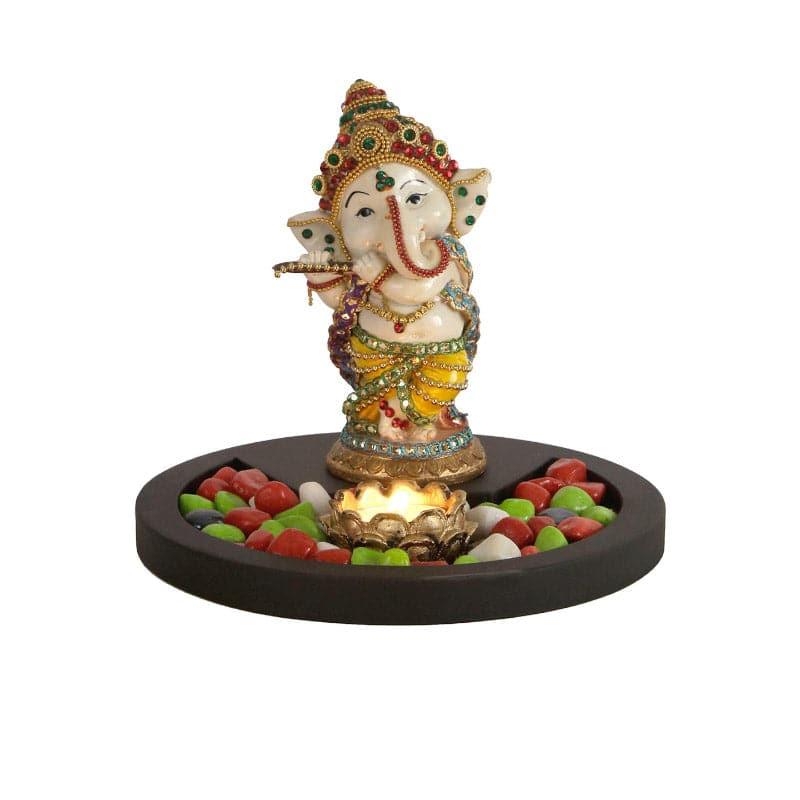 Buy Dancing Ganesha With Tealight Candle Holder Idols & Sets from Vaaree