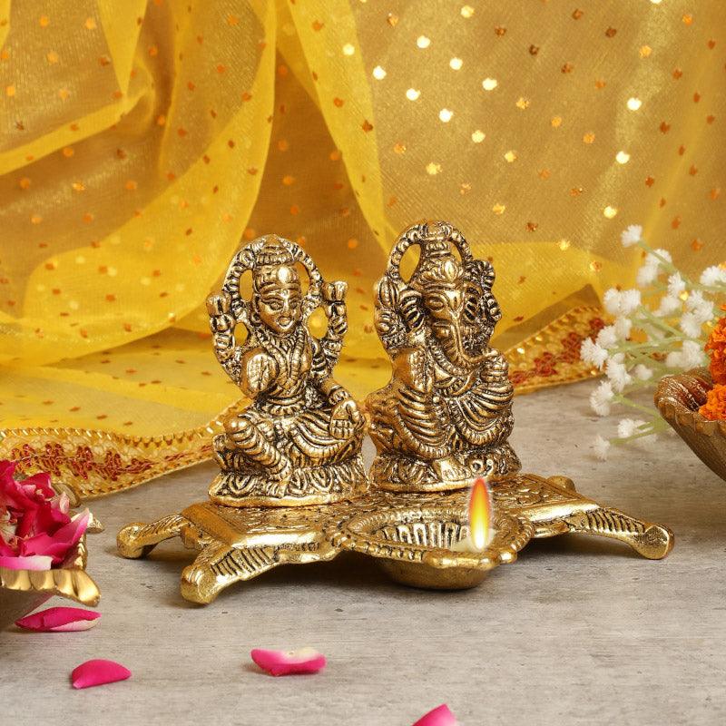 Buy Divine Laxmi Lambodara Idol Idols & Sets from Vaaree