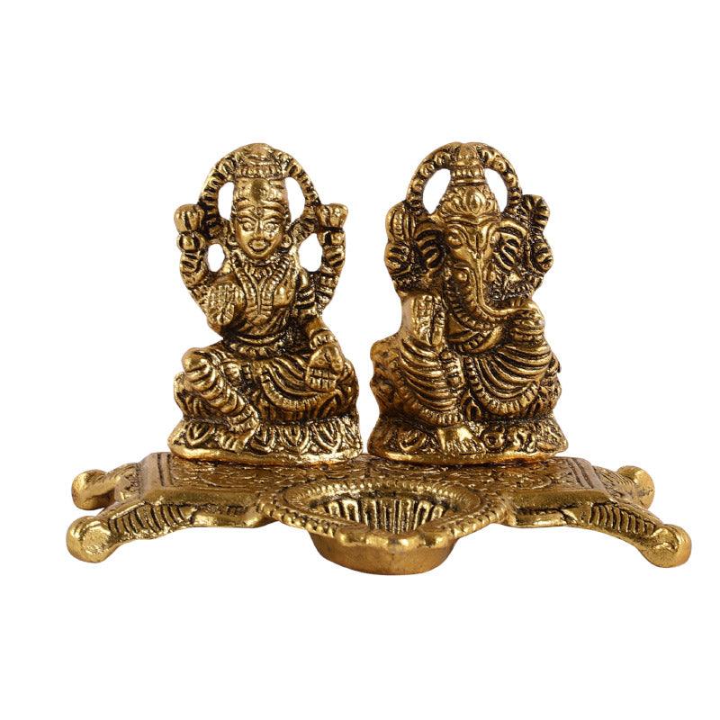 Buy Divine Laxmi Lambodara Idol Idols & Sets from Vaaree