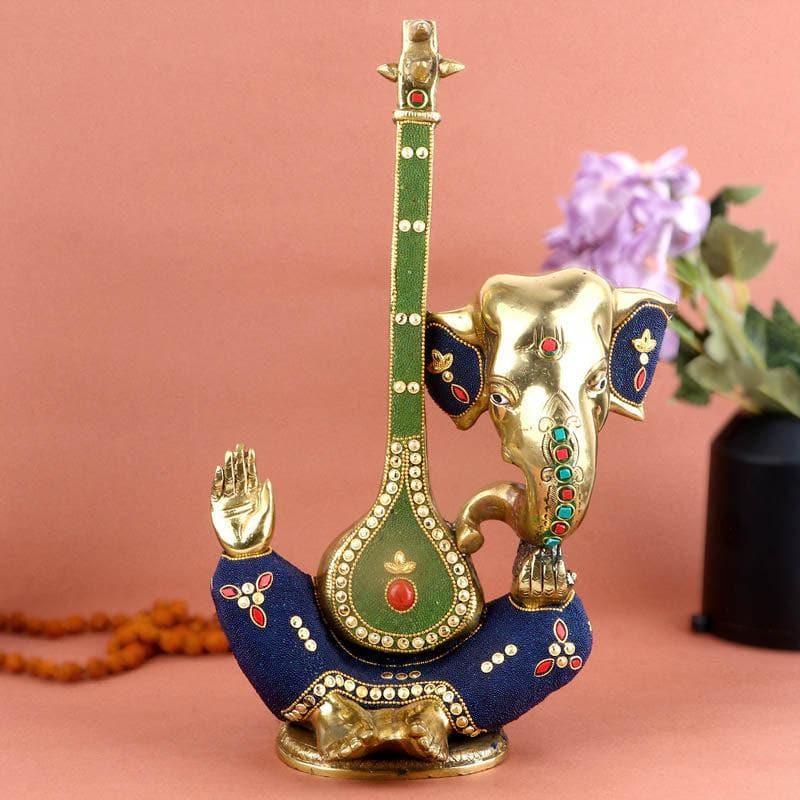 Buy Ganesha With Veena Brass Idol Idols & Sets from Vaaree