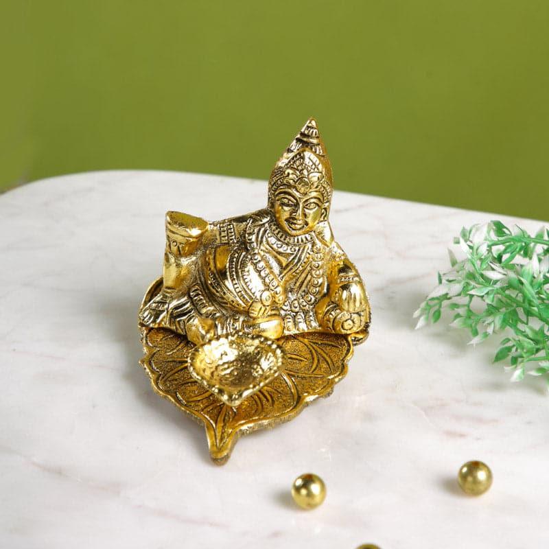 Buy Kuber Repose Idol And Diya Idols & Sets from Vaaree