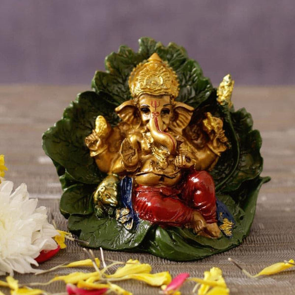 Buy Idols & Sets - Vinayaka Resting On Leaf Idol at Vaaree online