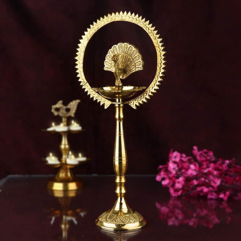 Buy Divine Aura Brass Lamp - Medium Lamps from Vaaree