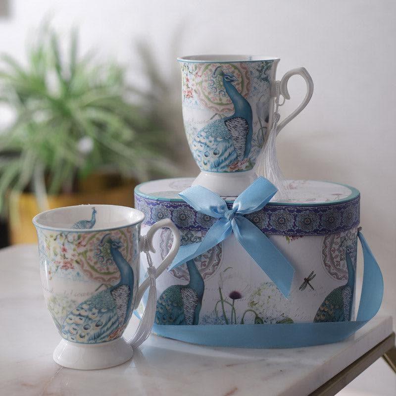 Buy Peacock Charm Mug (350 ML) - Set Of Two Mug & Tea Cup from Vaaree