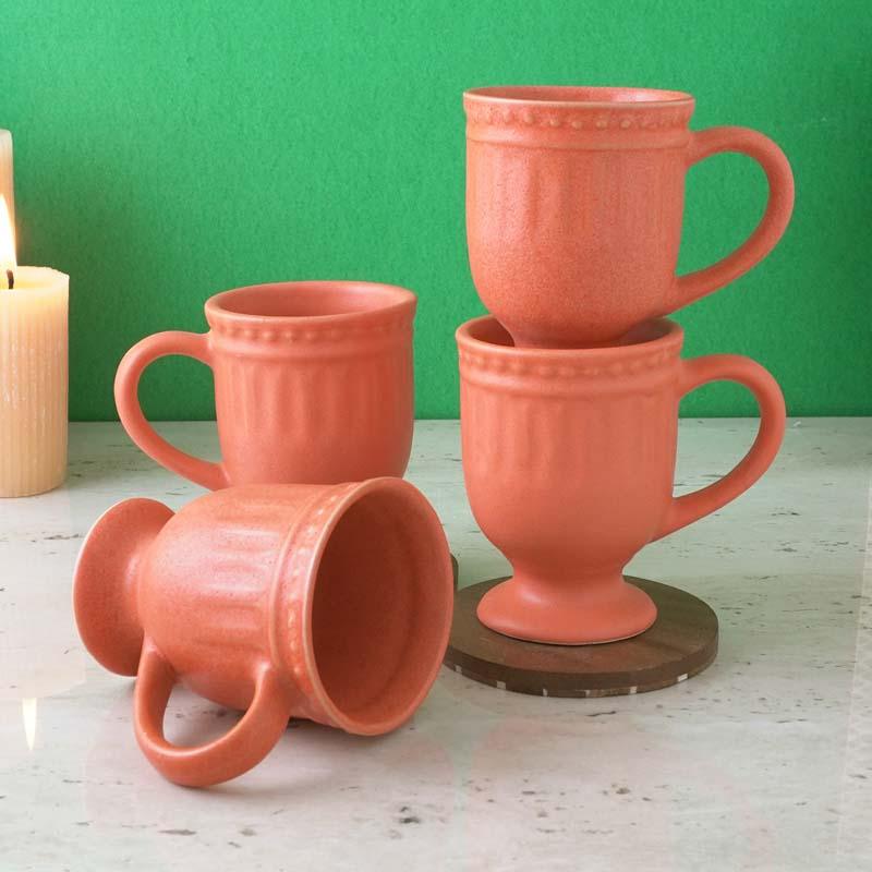 Buy Royal Orange Delphine Ceramic Mug (300 ML) - Set Of Four Mug & Tea Cup from Vaaree