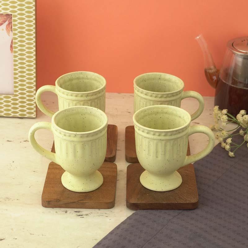 Buy Yellow Delphine Ceramic Mug (300 ML) - Set Of Four Mug & Tea Cup from Vaaree