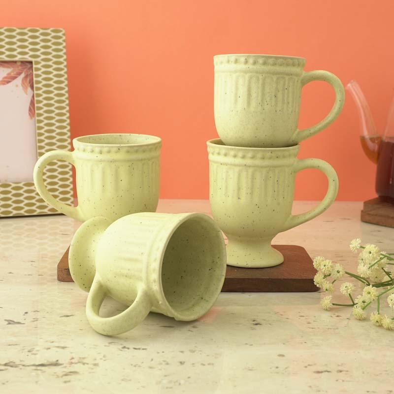 Buy Yellow Delphine Ceramic Mug (300 ML) - Set Of Four Mug & Tea Cup from Vaaree